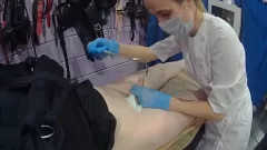 Play Hot Amateur Medical Fetish with Sounding in Tight Straitjacket